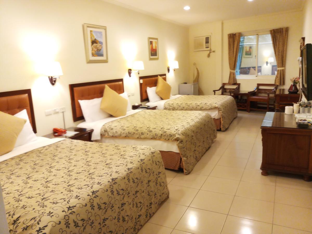 לונגטן Puti Commercial Hotel מראה חיצוני תמונה